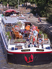 The Athos passing through historic locks